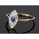 18 carat gold sapphire and diamond Art Deco style ring, the oval head with central sapphire