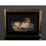 19th Century micro mosaic brooch, with a reclining spaniel on grass to the centre, 48mm diameter
