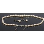 Pearl necklace, with a diamond set 14 carat white gold clasp, 40.5cm long