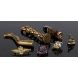 Collection of objects, to include two seals, a banded agate pendant, a snake sphere, a badge a