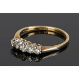 18 carat gold diamond set ring, with five round cut diamonds to the head, ring size L