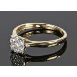 9 carat gold diamond set cluster ring, with a flower head set with diamonds at 0.25 carat in