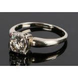 18 carat white gold diamond solitaire ring, the round cut diamond at an estimated 0.60 carats,