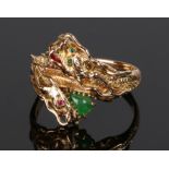 14 carat gold ruby and emerald set double headed dragon ring, the dragon heads each set with