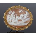 Large 19th Century cameo brooch, with a carved classical chariot scene, the filigree edge set with