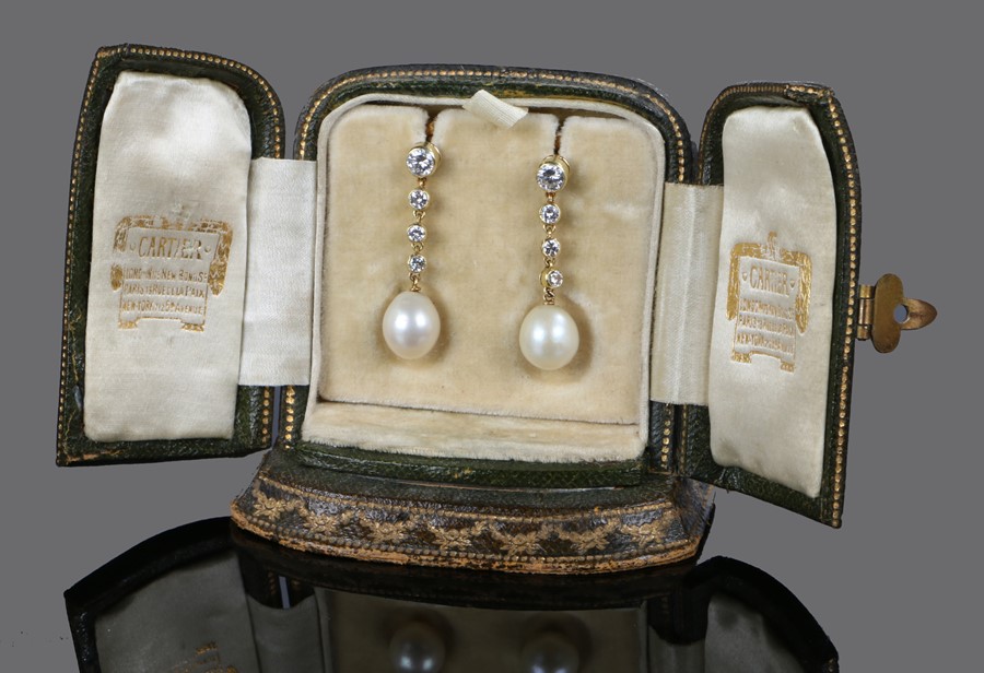 Cartier, a pair of natural pearl and diamond set earring drops, the certificated natural saltwater