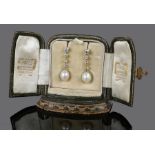 Cartier, a pair of natural pearl and diamond set earring drops, the certificated natural saltwater