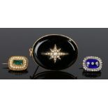 Three 19th Century brooches, to include a pearl set brooch with woven hair to the reverse, 47mm