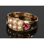 Antique 15 carat gold pearl and ruby ring, the two rows of three pearls flanked by a ruby to each