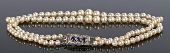 Pearl, Sapphire and diamond necklace, with a double row of graduated pearls attached to the sapphire