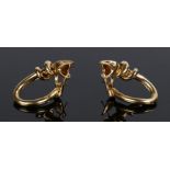 Boucheron, a pair of 18 carat gold earrings, in the form of leopards, 35mm high, 25 grams