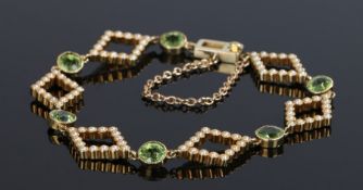 Peridot and Pearl bracelet with diamond shaped links set with pearls interspersed with peridot.