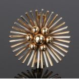 9 carat two colour gold brooch, the sunburst effect brooch with six orbs to the centre, 31mm