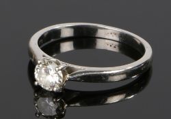 Platinum and diamond solitaire ring, the round cut diamond at approximately 0.60 carat, ring size P