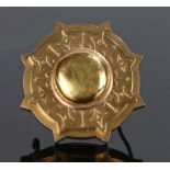 Victorian gold brooch, the dome centre with a circular roundel with projected points, 37mm diameter