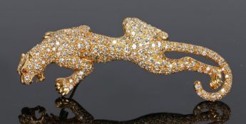 18 carat gold diamond set brooch, in the form of a tiger low on all fours, set with over two hundred
