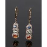Pair of 9 carat gold, diamond and gemstone set earrings, the central blue, green and orange