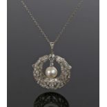 Diamond and pearl necklace, with a central pearl and a lappet diamond surround, an estimated total