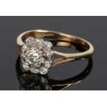 18 carat gold diamond set ring, the central round cut diamond at approximately 0.80 carat and a