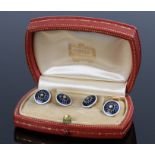 Pair of Cartier diamond and enamel cufflinks, the heads with a central diamond and blue guilloche