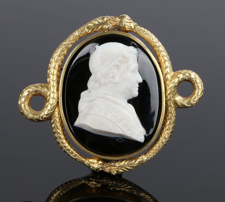 19th Century carved cameo brooch.the carved agate depicting a Pope with a dual serpent set around