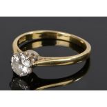 18 carat gold diamond solitaire ring, the round cut diamond at approximately 0.60 carat, ring size