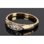 18 carat gold diamond set ring, with five diamonds to the head, ring size N 1/2