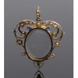 9 carat gold sapphire and pearl set pendant, with a central glazed front with pearl set swags above,