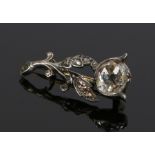 Victorian diamond set brooch, with a rose cut diamond flower head above diamond set petals, 23mm