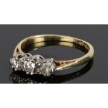 18 carat gold diamond set ring, with three diamonds to the head, ring size M