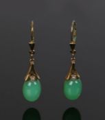 Chinese 8 carat gold and jade set earrings, with cabochon cut drops, the jade 8mm diameter