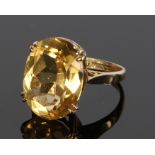 9 carat gold citrine set ring, with a facetted head and four claws, ring size L