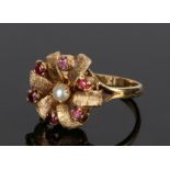 9 carat gold pearl and garnet set ring, with a central pearl and garnet surround, ring size M