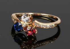 18 carat diamond, ruby and sapphire ring, with diamond set shoulders, ring size P, 2.7g