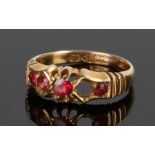 18 carat gold and ruby set ring, the head with four rubies, one stone missing, ring size H