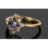 18 carat gold and sapphire ring, with a central sapphire and diamond surround, ring size M 1/2