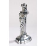 Table lighter, with chrome effect, depicting the devil forming the hinged lid above a nude female