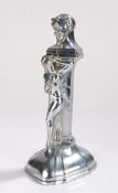 Table lighter, with chrome effect, depicting the devil forming the hinged lid above a nude female