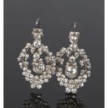 Impressive pair of diamond set earrings, with an estimated total diamond weight of 4.68 carats to