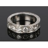 18 carat white gold diamond set half eternity ring, with a row of eight round cut diamonds to the