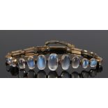 Moonstone set bracelet, with a row of graduated cabochon cut moonstones, 13.5cm long