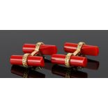 Pair of coral cufflinks, red tube form with silver gilt links