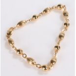 9 carat gold bracelet, formed from reeded orb form links, 6.2g