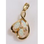 14 carat gold pendant, set with three opals, 1.5g