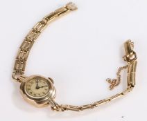 9 carat gold ladies wristwatch, the dial with Arabic numerals, manual wound, the case 15.5mm wide,