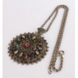 Middle Eastern white metal medallion and chain, the medallion with multi-coloured pearl cut beads to