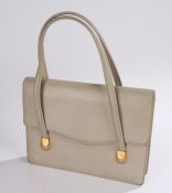 Gucci ladies handbag, the grey leather exterior with gilt mounts, stamped "Made in Italy by Gucci"
