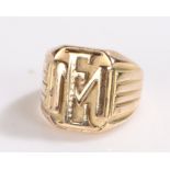 Unmarked yellow metal ring, the rectangular head with raised initials EM, ring size L 1/2, 8.2g