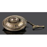 Victorian brooch, the oval brooch with a dome centre and rear glazed panel, 40mm long