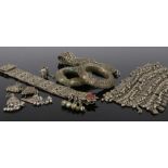 Collection of Omani jewellery, to include belts, two bangles, earrings, drop bracelet, (7)